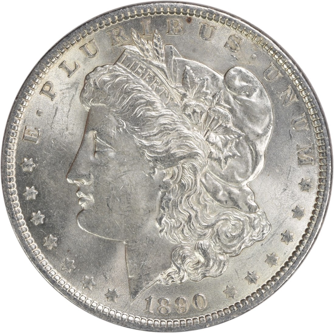 1890 Morgan Silver Dollar Choice BU Uncertified Silver Coin: 1890 Morgan Silver Dollar Choice BU Uncertified Silver Coin This 1890 Morgan Silver Dollar is a stunning example of American coinage, featuring a vibrant shine and intricate details that reflect its u