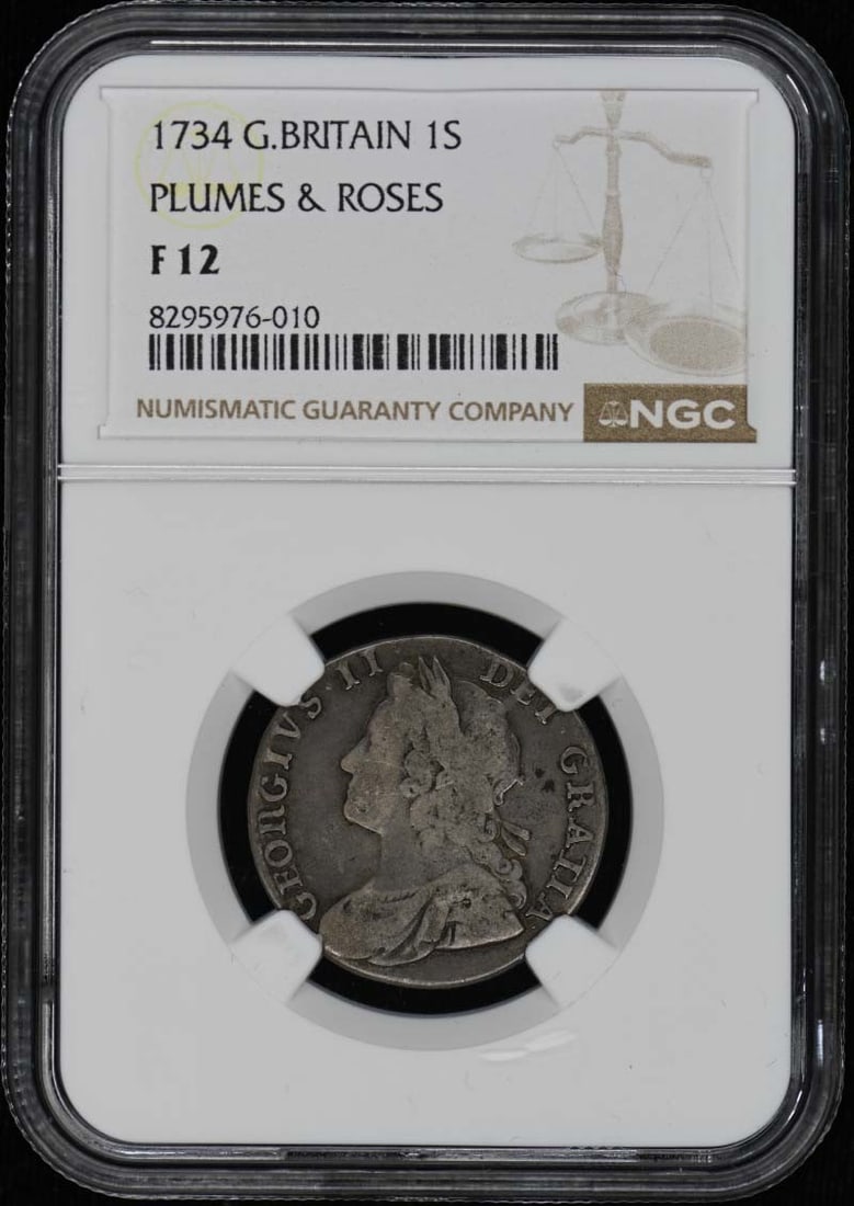 1734 Silver Shilling NGC F12 Great Britain Plumes and Roses ESC-1197: 1734 Silver Shilling NGC F12 Great Britain Plumes and Roses ESC-1197 This is a 1734 Great Britain Plumes & Roses silver shilling graded F12 by NGC. The coin is circulated and originates from the Unite
