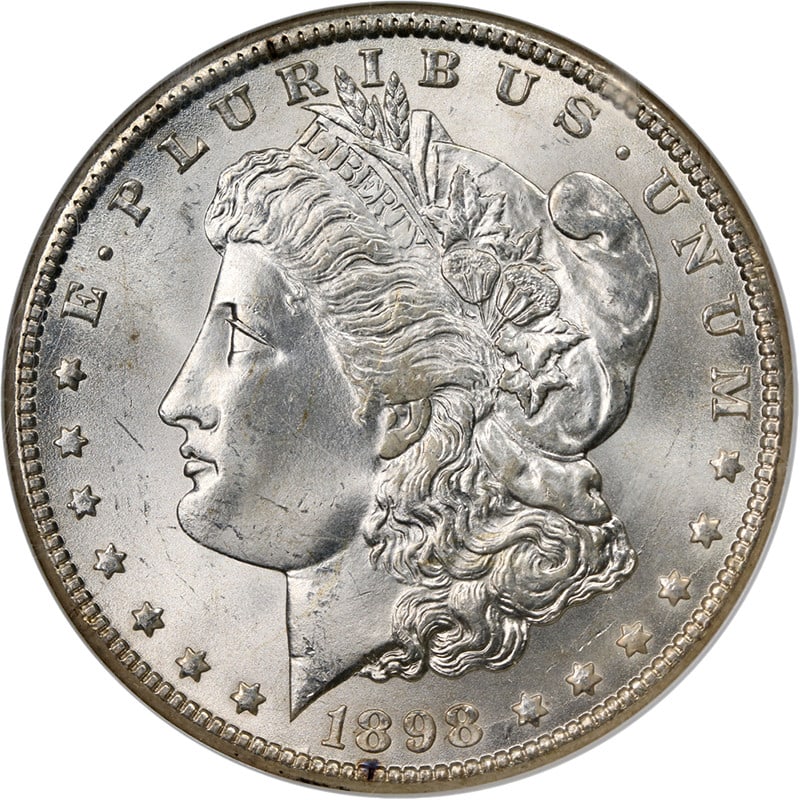 1898-O Morgan Silver Dollar NGC MS66 Uncirculated Silver Coin: 1898-O Morgan Silver Dollar NGC MS66 Uncirculated Silver Coin This 1898-O Morgan Silver Dollar, certified by NGC with a grade of MS66, showcases exceptional eye appeal and striking luster. The coin fe