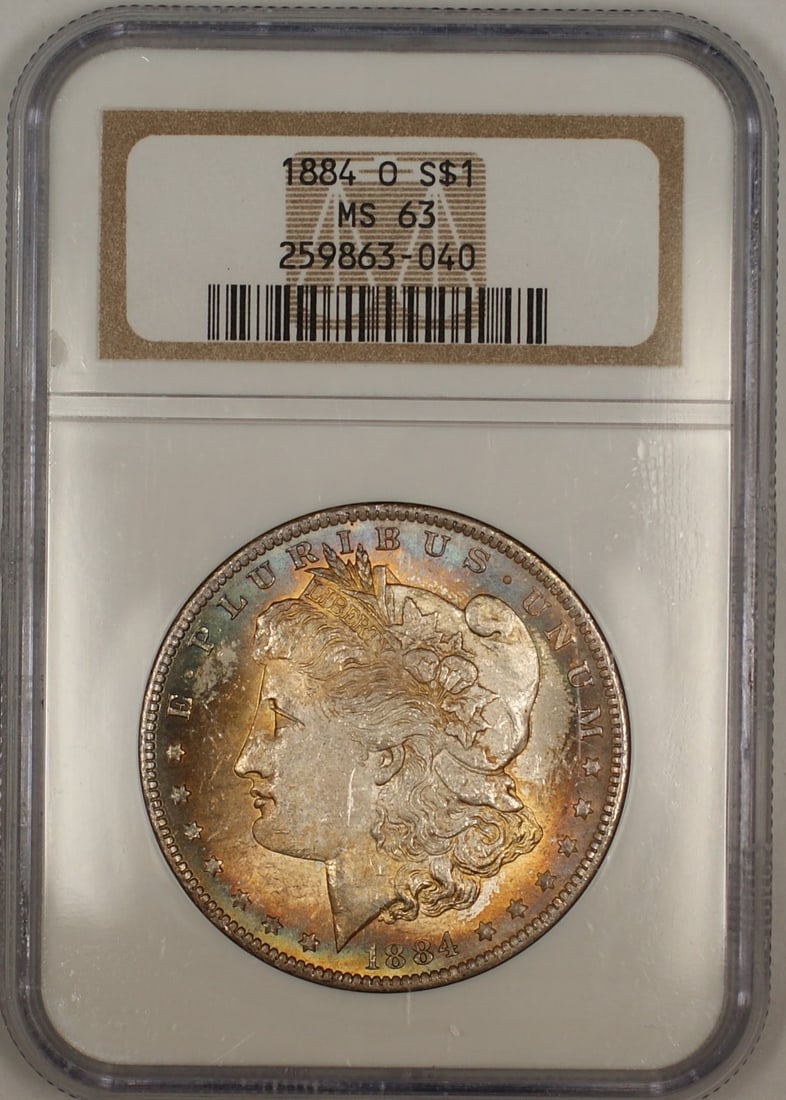 NGC MS 63 1884-O Morgan Silver Dollar with Vibrant Toning: NGC MS 63 1884-O Morgan Silver Dollar with Vibrant Toning This 1884-O Morgan Silver Dollar features attractive toning on both the obverse and reverse. Certified by NGC with a grade of MS 63, it was mi