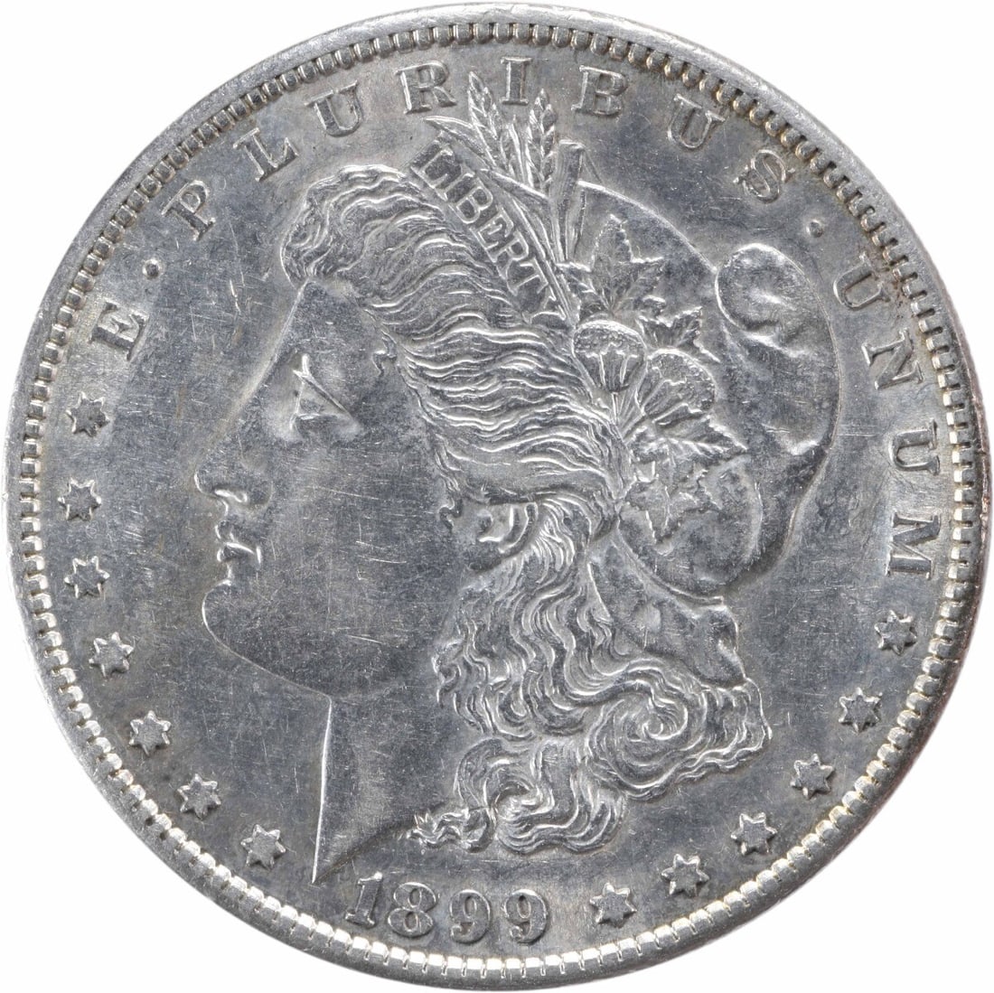 1899-S Morgan Silver Dollar AU Uncertified 90% Silver Coin: 1899-S Morgan Silver Dollar AU Uncertified 90% Silver Coin This 1899-S Morgan Silver Dollar is a remarkable piece of American numismatic history. Featuring the iconic design by George T. Morgan, this
