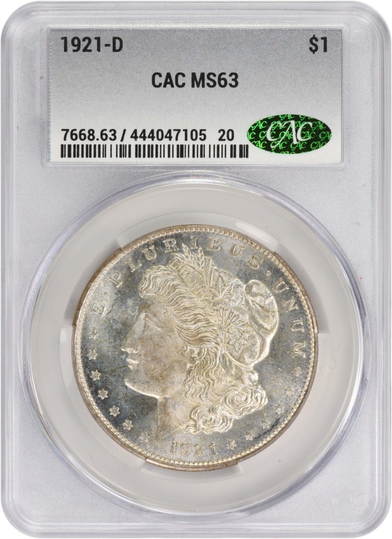 1921-D Morgan Silver Dollar MS63 CACG Uncirculated 90% Silver: 1921-D Morgan Silver Dollar MS63 CACG Uncirculated 90% Silver This 1921-D Morgan Silver Dollar is a stunning example of American coinage, displaying the artistry of designer George T. Morgan. Graded M