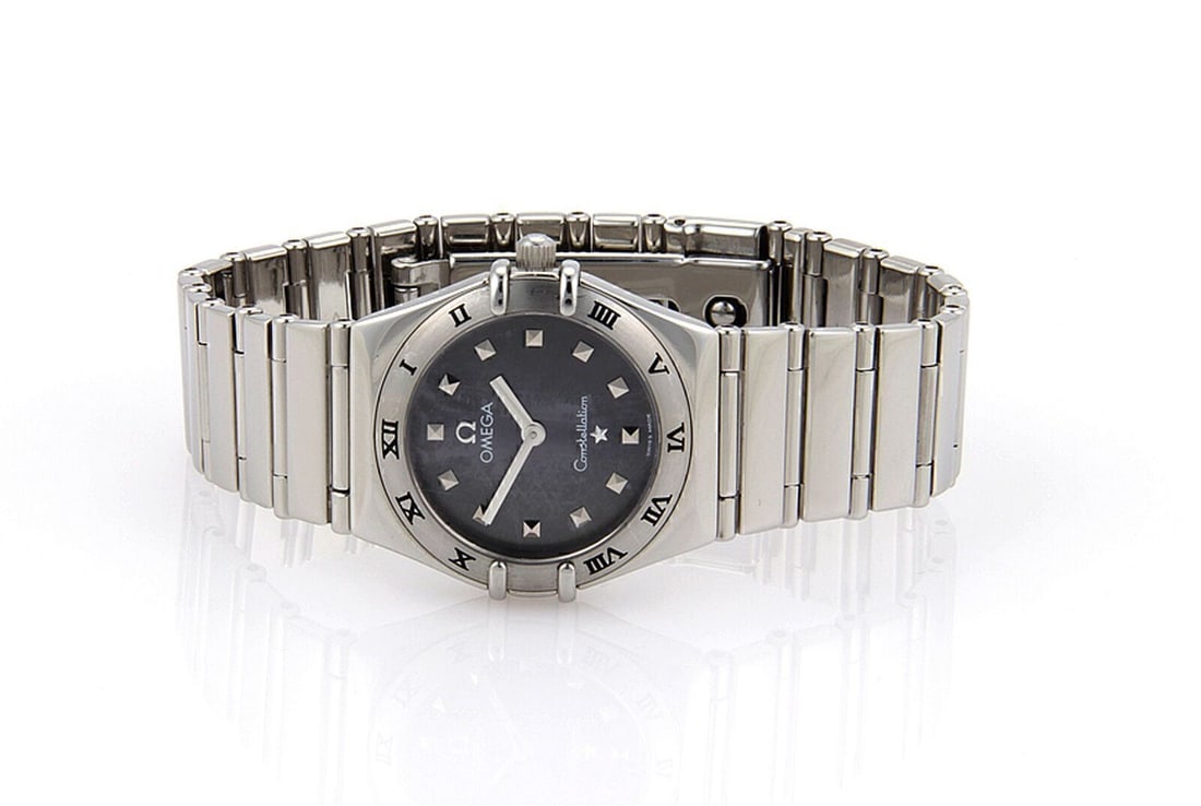 Stainless Steel Gray Dial Omega Constellation Quartz Watch for Women: Stainless Steel Gray Dial Omega Constellation Quartz Watch for Women This OMEGA Women's Constellation wristwatch features a stainless steel case and bracelet with a refined gray dial. Powered by a Swi