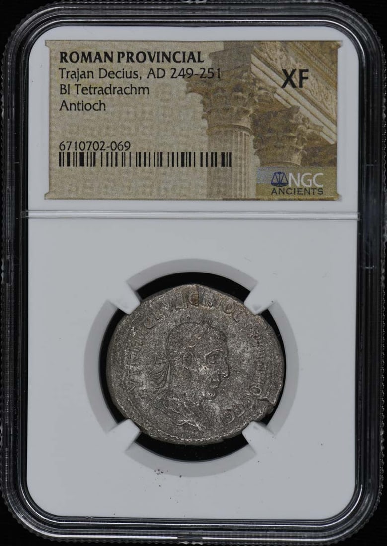NGC XF40 Roman Provincial BI Tetradrachm of Trajan Decius: NGC XF40 Roman Provincial BI Tetradrachm of Trajan Decius This Roman Provincial BI Tetradrachm from the reign of Trajan Decius (AD 249-251) is certified by NGC with a grade of XF40. Originating from I