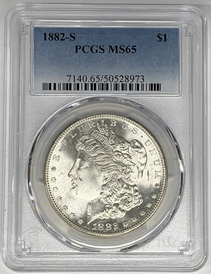 PCGS MS 65 1882-S Silver Morgan Dollar Uncirculated United States: PCGS MS 65 1882-S Silver Morgan Dollar Uncirculated United States This is an 1882-S Morgan Silver Dollar certified by PCGS with a grade of MS 65. The coin is uncirculated and composed of silver, origi