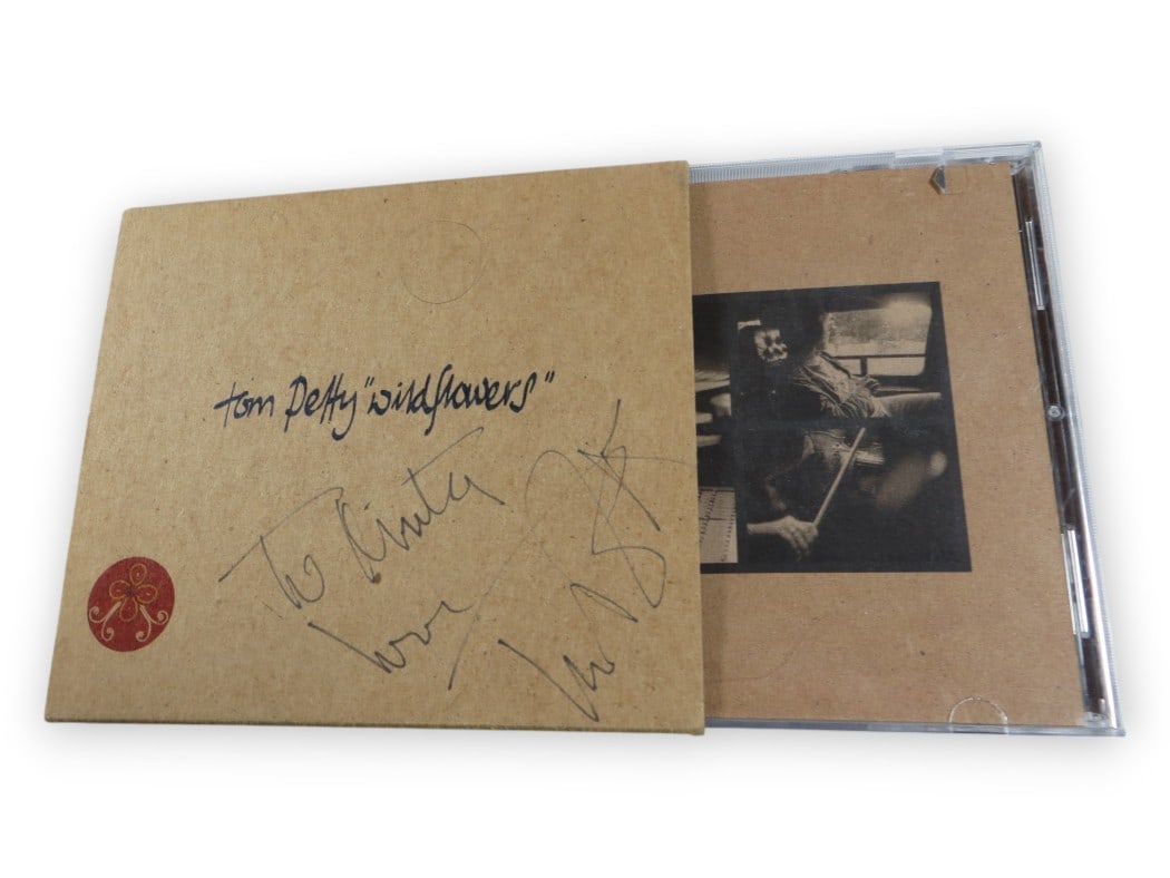 Tom Petty Signed Wildflowers CD Cover JSA Certified Autograph: Tom Petty Signed Wildflowers CD Cover JSA Certified Autograph This is a Tom Petty autographed CD cover for the album 'Wildflowers.' The item is an original piece, including the CD(s), which have not b