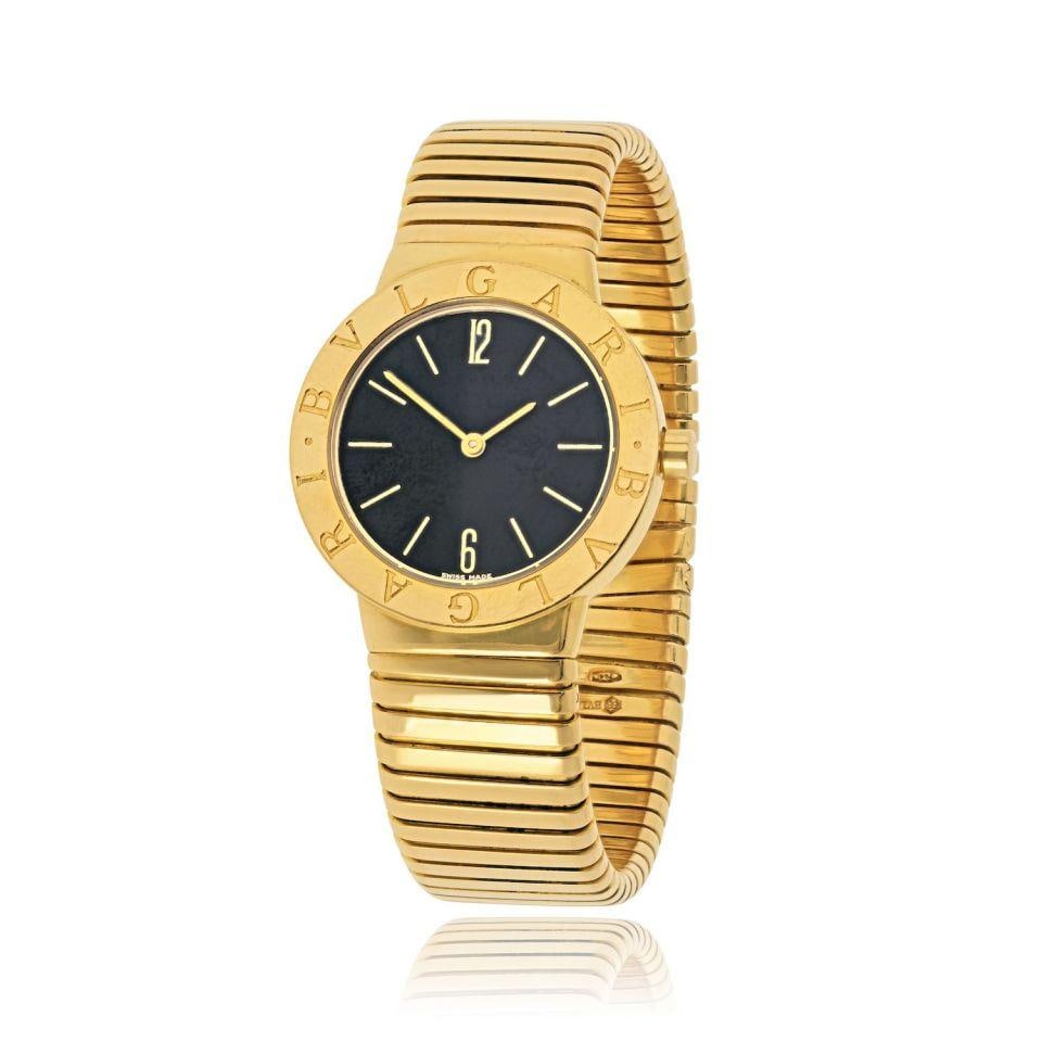 18K Yellow Gold Bvlgari Tubogas Vintage Watch with 30mm Round Dial: 18K Yellow Gold Bvlgari Tubogas Vintage Watch with 30mm Round Dial This vintage Bvlgari Tubogas watch is crafted in 18K yellow gold and features a classic round 30mm dial. The substantial gold constru