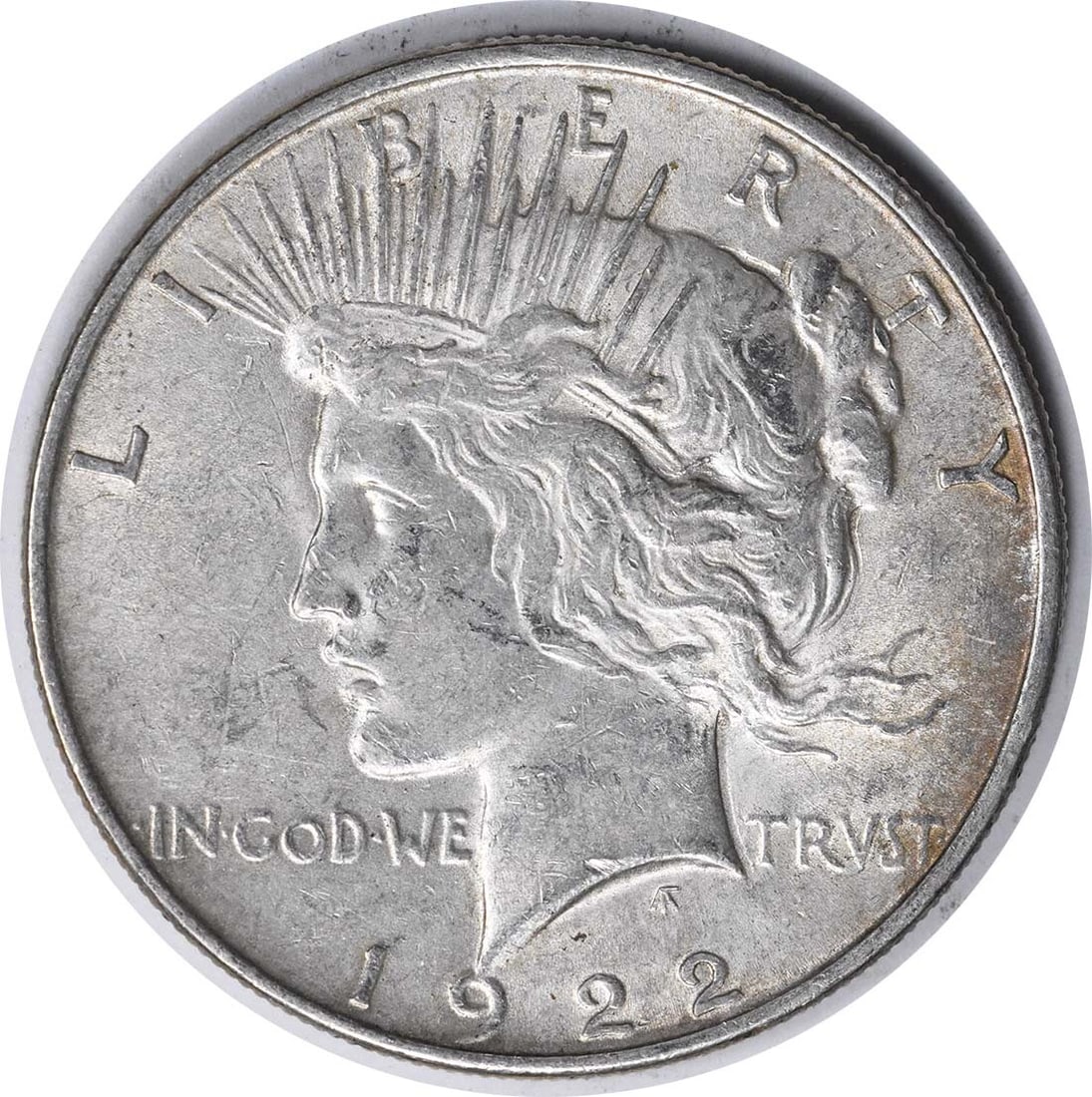 1922 Peace Dollar AU Uncertified by Anthony de Francisci: 1922 Peace Dollar AU Uncertified by Anthony de Francisci This 1922 VAM 1F Peace Dollar is a remarkable piece of numismatic history. Struck in Philadelphia, this coin features a stunning design by Anth
