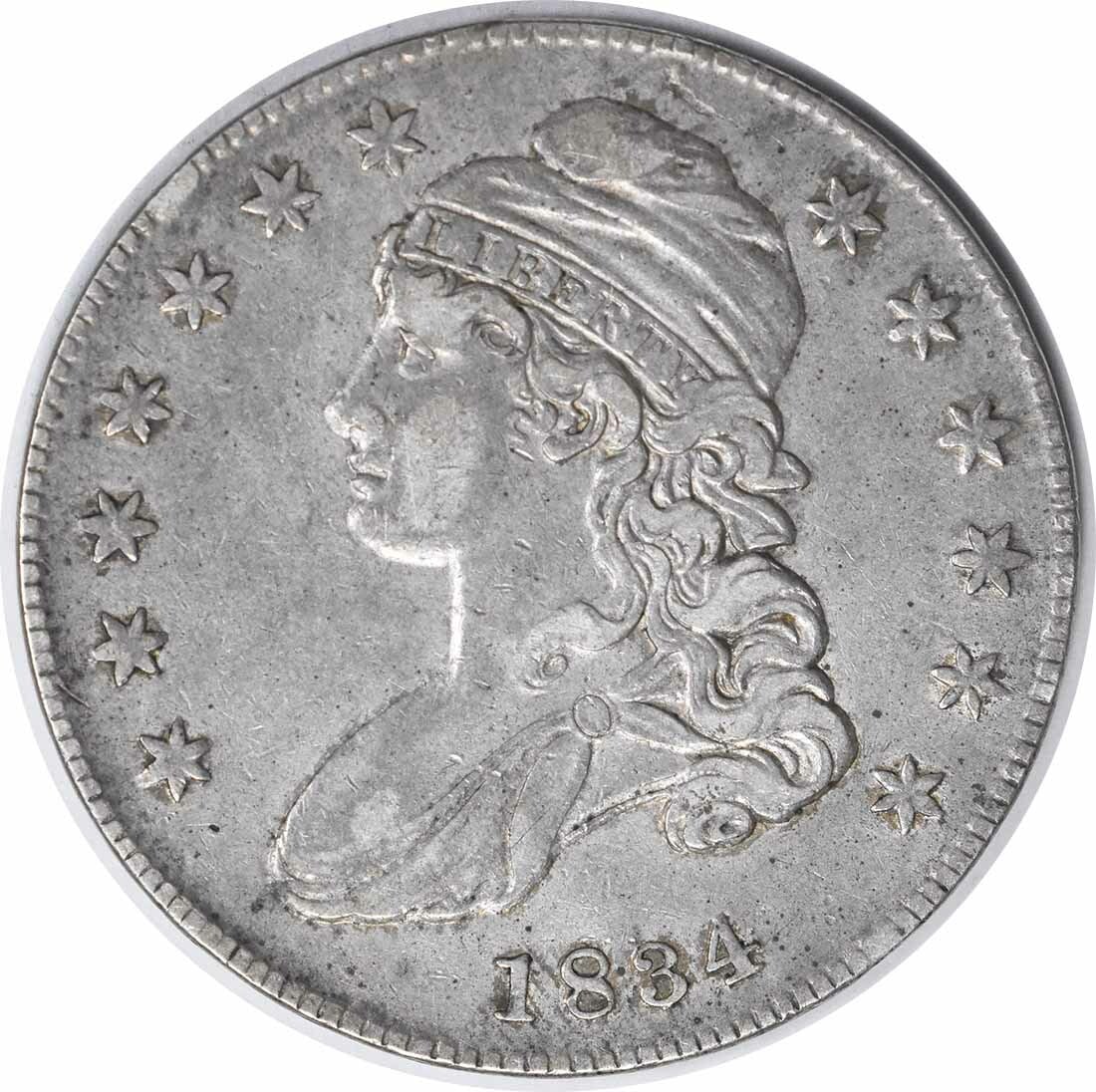 1834 Bust Half Dollar Large Date Small Letters 50C Silver Coin: 1834 Bust Half Dollar Large Date Small Letters 50C Silver Coin This 1834 Bust Half Dollar features the large date and small letters design, produced at the Philadelphia mint. It is classified as circu
