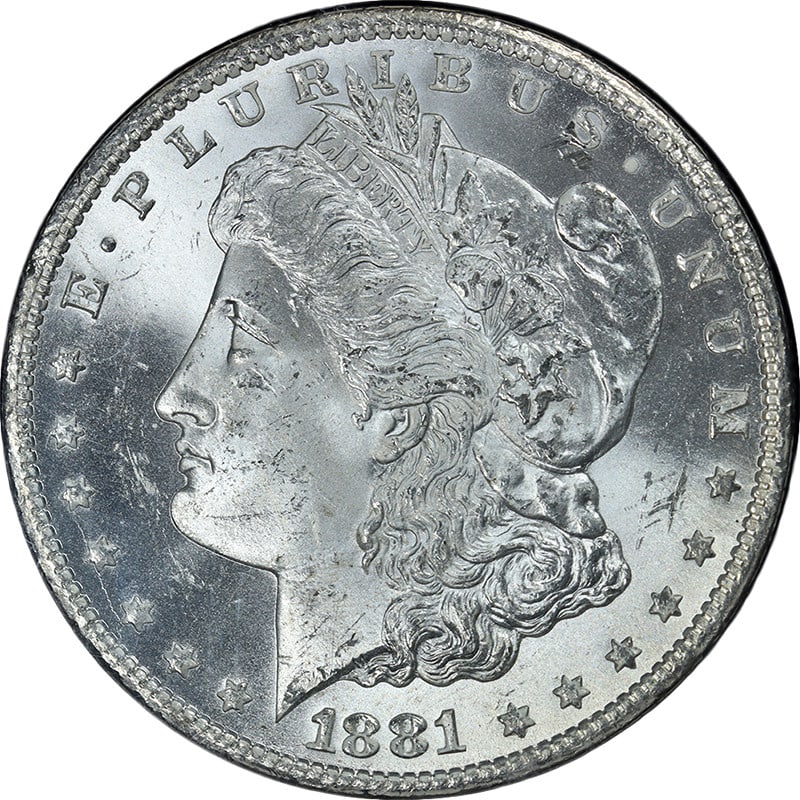 NGC MS63 1881-CC Morgan Dollar GSA Holder Blast White Uncirculated Silver Coin: NGC MS63 1881-CC Morgan Dollar GSA Holder Blast White Uncirculated Silver Coin This 1881-CC GSA Morgan Silver Dollar is certified by NGC with a grade of MS63. The coin is uncirculated and features a b