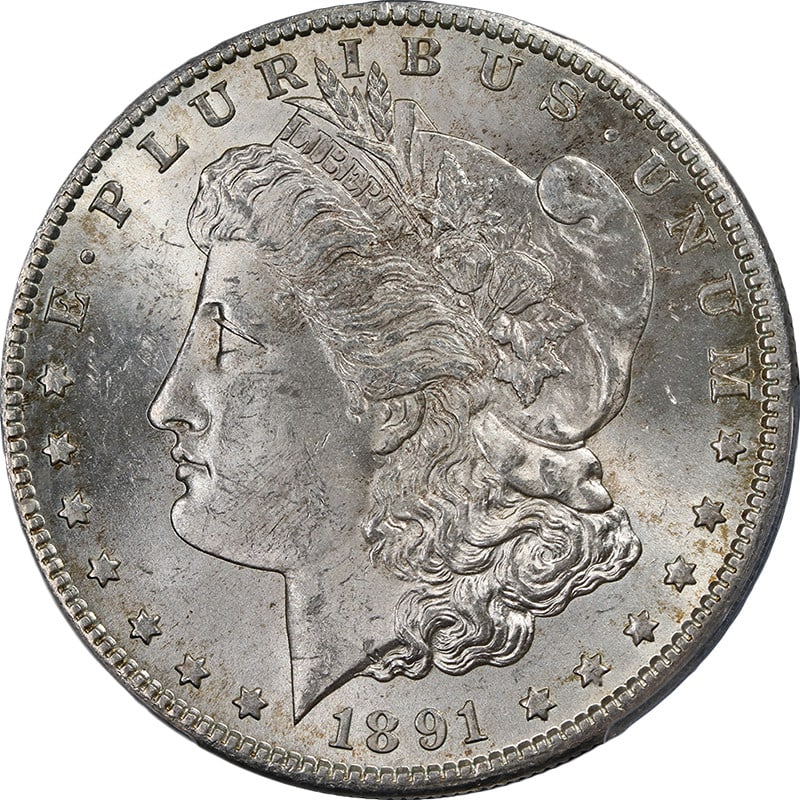 PCGS MS63 1891-S Silver Morgan Dollar Uncirculated US Coin: PCGS MS63 1891-S Silver Morgan Dollar Uncirculated US Coin This stunning 1891-S Morgan Silver Dollar, graded PCGS MS63, showcases exceptional eye appeal with a brilliant white finish and fantastic lus