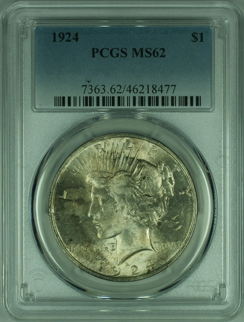 PCGS MS-62 1924 Peace Silver Dollar with Attractive Toning: PCGS MS-62 1924 Peace Silver Dollar with Attractive Toning This 1924 Peace Silver Dollar is certified by PCGS with a grade of MS-62 and features natural toning. The coin was minted in Philadelphia and