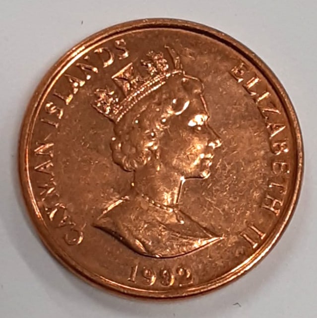 Roll of 50 Uncirculated 1992 Cayman Islands 1 Cent Coins KM 87a: Roll of 50 Uncirculated 1992 Cayman Islands 1 Cent Coins KM 87a This is a roll of fifty uncirculated 1992 Cayman Islands 1 Cent coins featuring Queen Elizabeth II. Each coin is composed of copper-plat