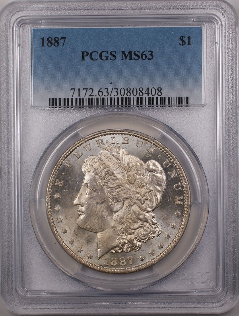 PCGS MS-63 1887 Silver Morgan Dollar Philadelphia Mint Certified Coin: PCGS MS-63 1887 Silver Morgan Dollar Philadelphia Mint Certified Coin This 1887 Morgan Silver Dollar is graded MS-63 by PCGS and was minted in Philadelphia. Composed of silver, this uncirculated coin
