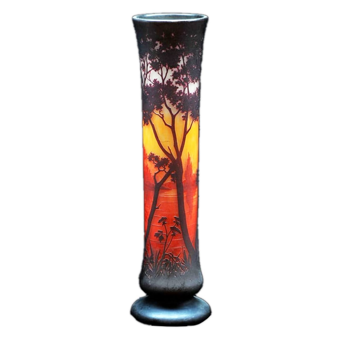 Daum Nancy Scenic Cameo Glass Footed Vase 1900-1919: Daum Nancy Scenic Cameo Glass Footed Vase 1900-1919 This exquisite Daum Nancy Cameo Glass Footed Scenic Vase showcases the artistry of hand-blown glassmaking from the early 20th century. Standing at a