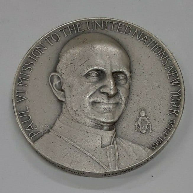 1965 Fine Silver Medal Commemorating Pope Paul VI United Nations Visit by Medallic Art Co: 1965 Fine Silver Medal Commemorating Pope Paul VI United Nations Visit by Medallic Art Co This 1965 commemorative medal celebrates Pope Paul VI's mission to the United Nations. Struck by the Medallic