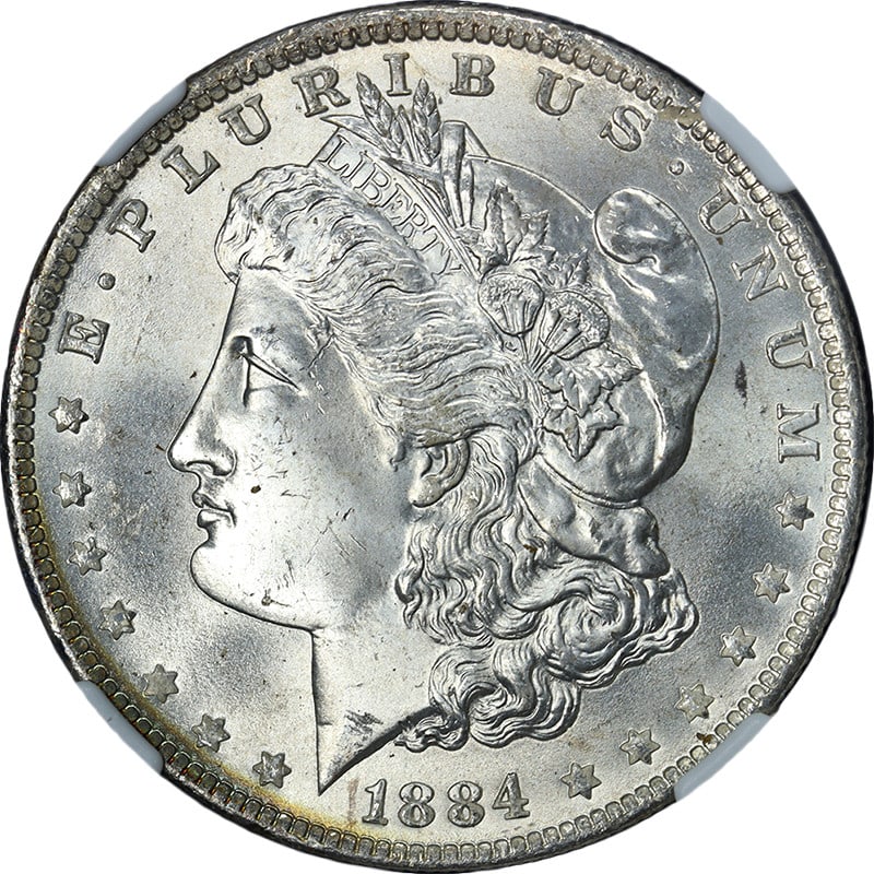 NGC MS65 Uncirculated 1884-O Morgan Silver Dollar with Strong Strike: NGC MS65 Uncirculated 1884-O Morgan Silver Dollar with Strong Strike This original 1884-O Morgan Silver Dollar is certified by NGC with a grade of MS65. It features excellent eye appeal, fantastic lus