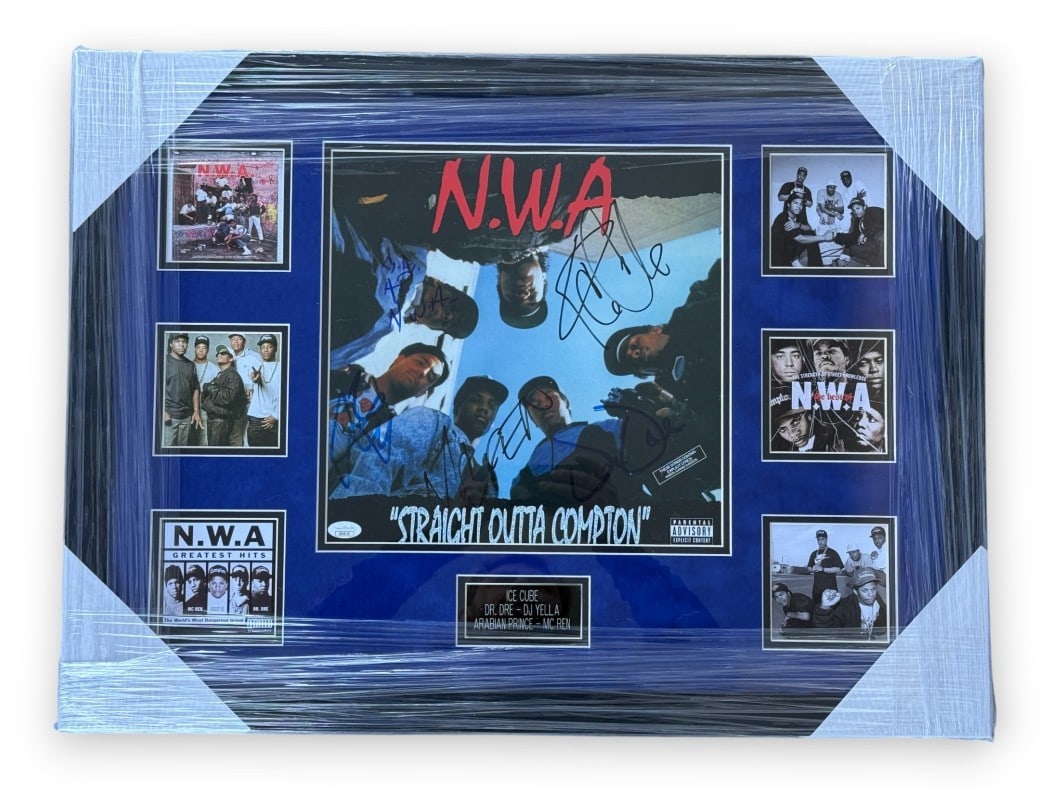 Framed Album Cover with N.W.A Signatures JSA Authenticated: Framed Album Cover with N.W.A Signatures JSA Authenticated This is an original N.W.A album cover that has been autographed by Ice Cube, Dr. Dre, DJ Yella, Arabian Prince, and MC Ren. The signed album