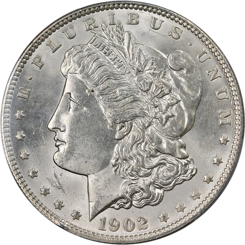 PCGS MS64 1902-P Morgan Dollar Silver Coin With Exceptional Luster: PCGS MS64 1902-P Morgan Dollar Silver Coin With Exceptional Luster This stunning 1902-P Morgan Silver Dollar is graded MS64 by PCGS, showcasing incredible eye appeal with its blazing white gem finish.
