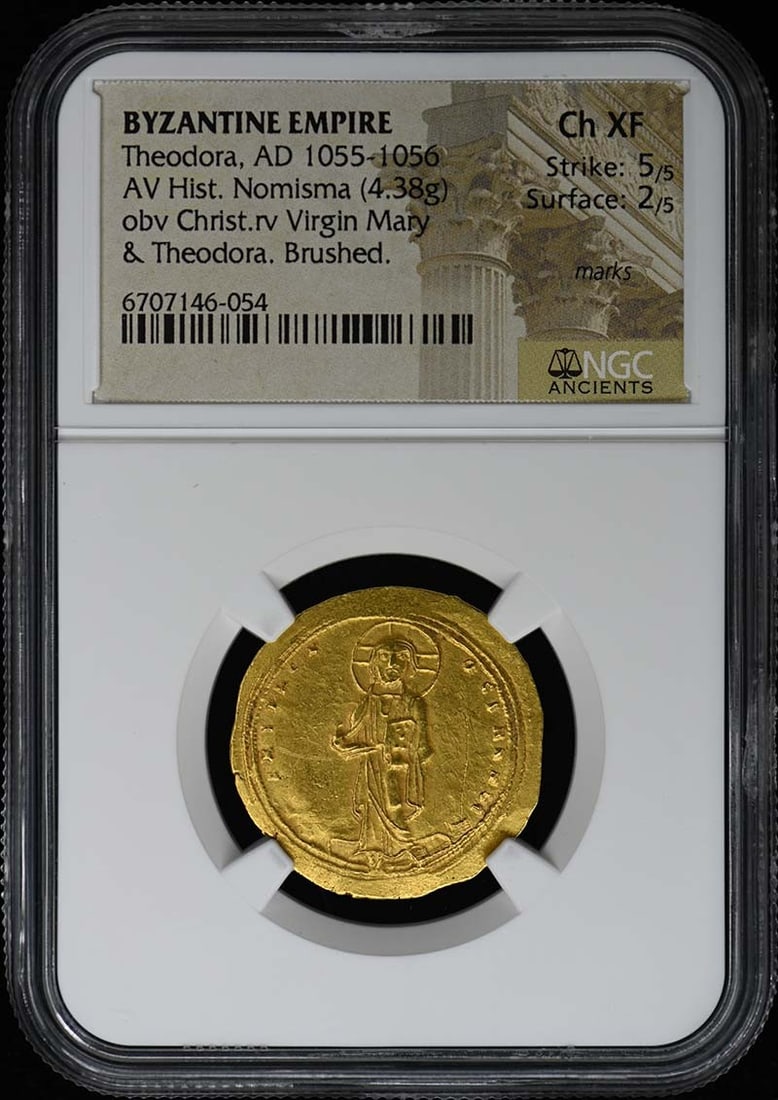 Byzantine Nomisma Coin AD 1055-1056 NGC Ch XF Depicting Christ and Mary: Byzantine Nomisma Coin AD 1055-1056 NGC Ch XF Depicting Christ and Mary This is a Byzantine gold histamenon nomisma coin from the reign of Theodora (AD 1055-1056), featuring religious imagery of Chris