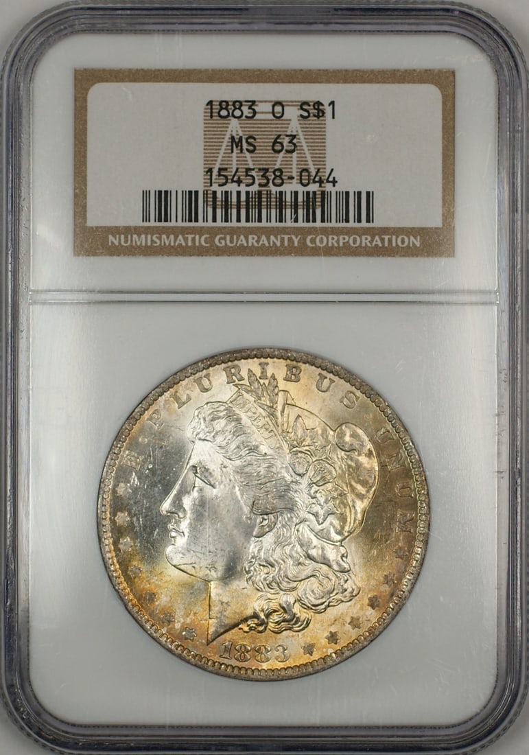 NGC MS 63 1883-O Morgan Silver Dollar with Attractive Toning: NGC MS 63 1883-O Morgan Silver Dollar with Attractive Toning This 1883-O Morgan Silver Dollar is an un-used $1 coin certified by NGC with a grade of MS 63. Struck at the New Orleans Mint, the coin fea