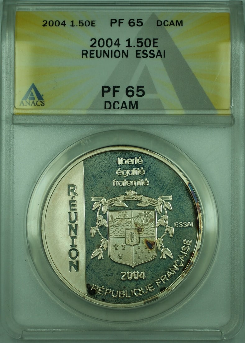 France 2004 Reunion Essai 1.5 Euro Silver Proof Coin ANACS PR 65: France 2004 Reunion Essai 1.5 Euro Silver Proof Coin ANACS PR 65 This 2004 1.5 Euro proof silver coin from France features the Reunion Essai design. The coin is composed of silver and has been certifi