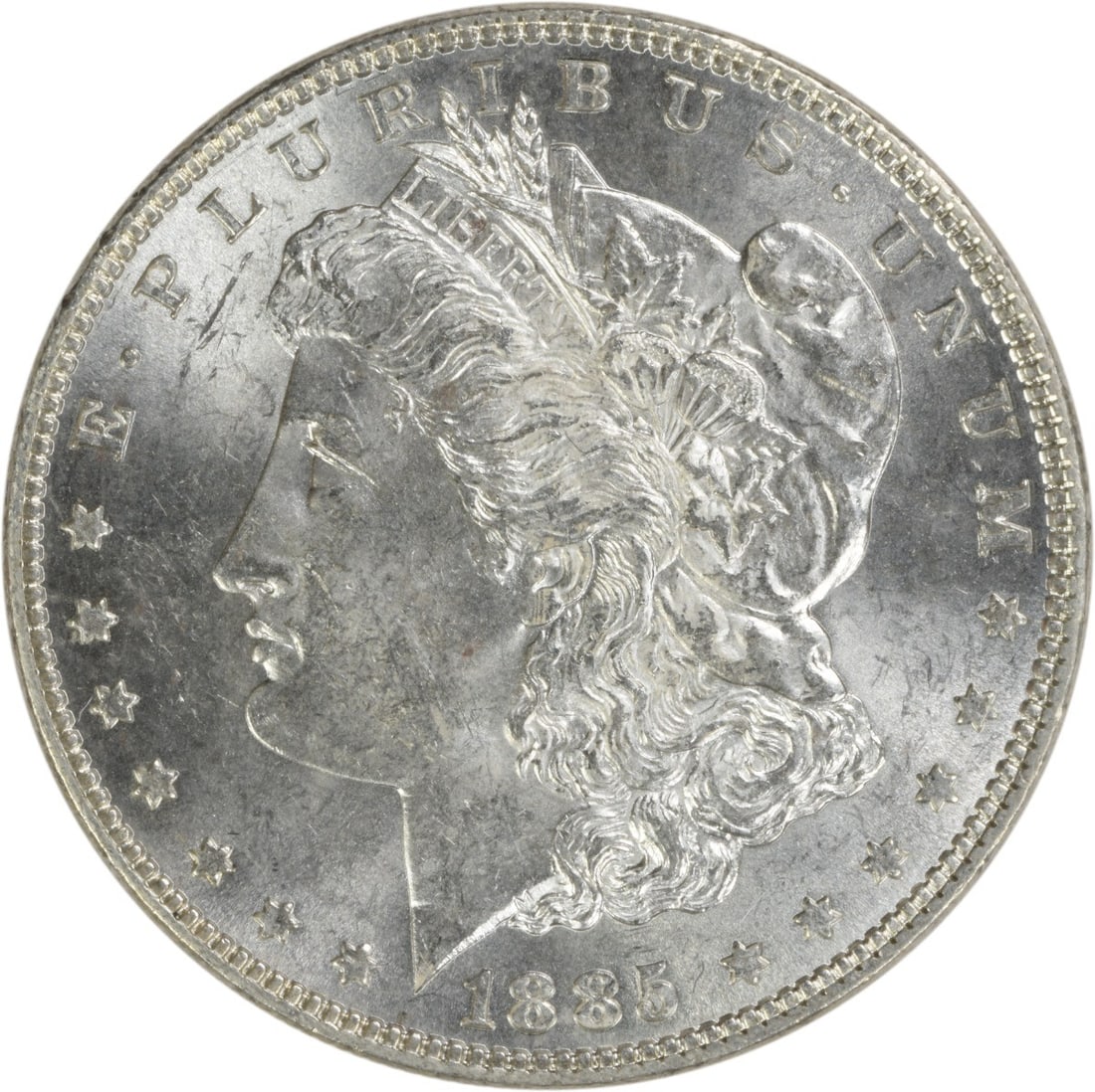 1885 Morgan Silver Dollar Uncertified BU Silver Coin: 1885 Morgan Silver Dollar Uncertified BU Silver Coin This 1885 Morgan Silver Dollar is an uncirculated coin featuring a beautiful BU (Brilliant Uncirculated) grade. Struck in silver with no mint mark,