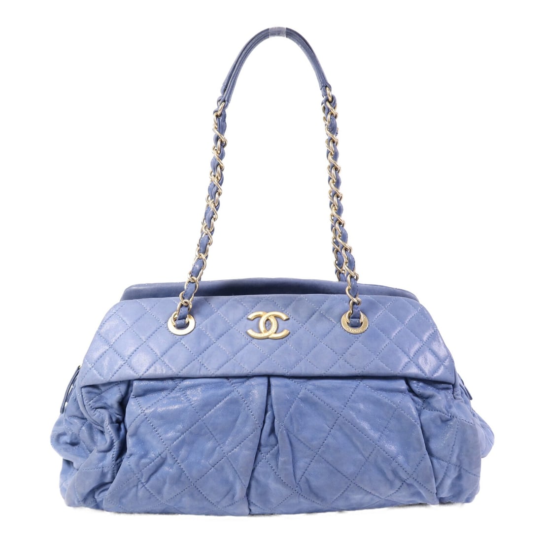 Calfskin Blue Tote Bag by CHANEL CC with Gold Hardware: Calfskin Blue Tote Bag by CHANEL CC with Gold Hardware This CHANEL tote bag is crafted from blue calfskin leather and features the iconic CC logo with gold tone hardware. Made in France, it is designe