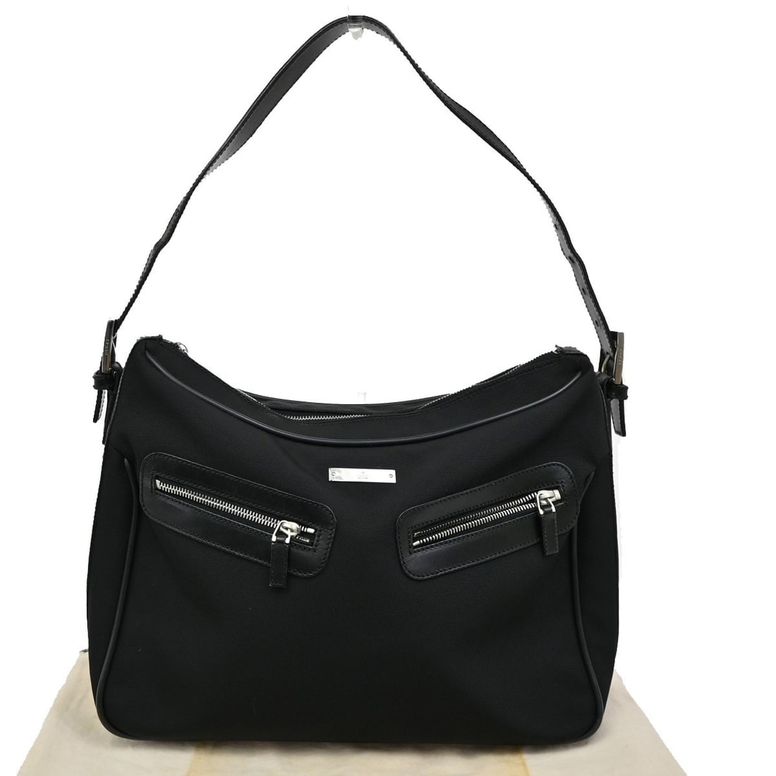 Gucci Black Canvas Vintage Shoulder Bag for Women: Gucci Black Canvas Vintage Shoulder Bag for Women This Gucci vintage shoulder bag features a black canvas exterior and is designed for women. The bag shows signs of previous use, including scuffs, dir