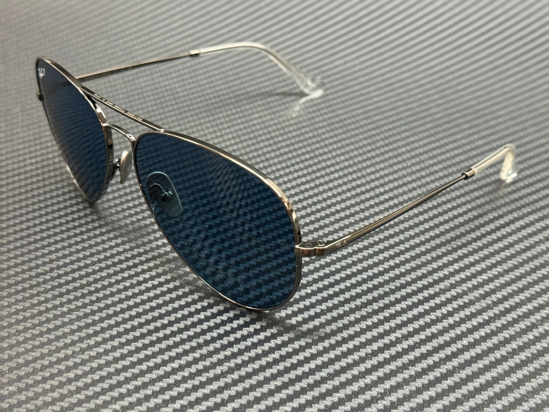 Ray-Ban RB8089 165 S2 Gunmetal Titanium Blue Polarized Sunglasses: Ray-Ban RB8089 165 S2 Gunmetal Titanium Blue Polarized Sunglasses Discover the stylish RAY BAN RB8089 165 S2 Sunglasses featuring a sleek gunmetal titanium frame and striking blue polarized lenses. De