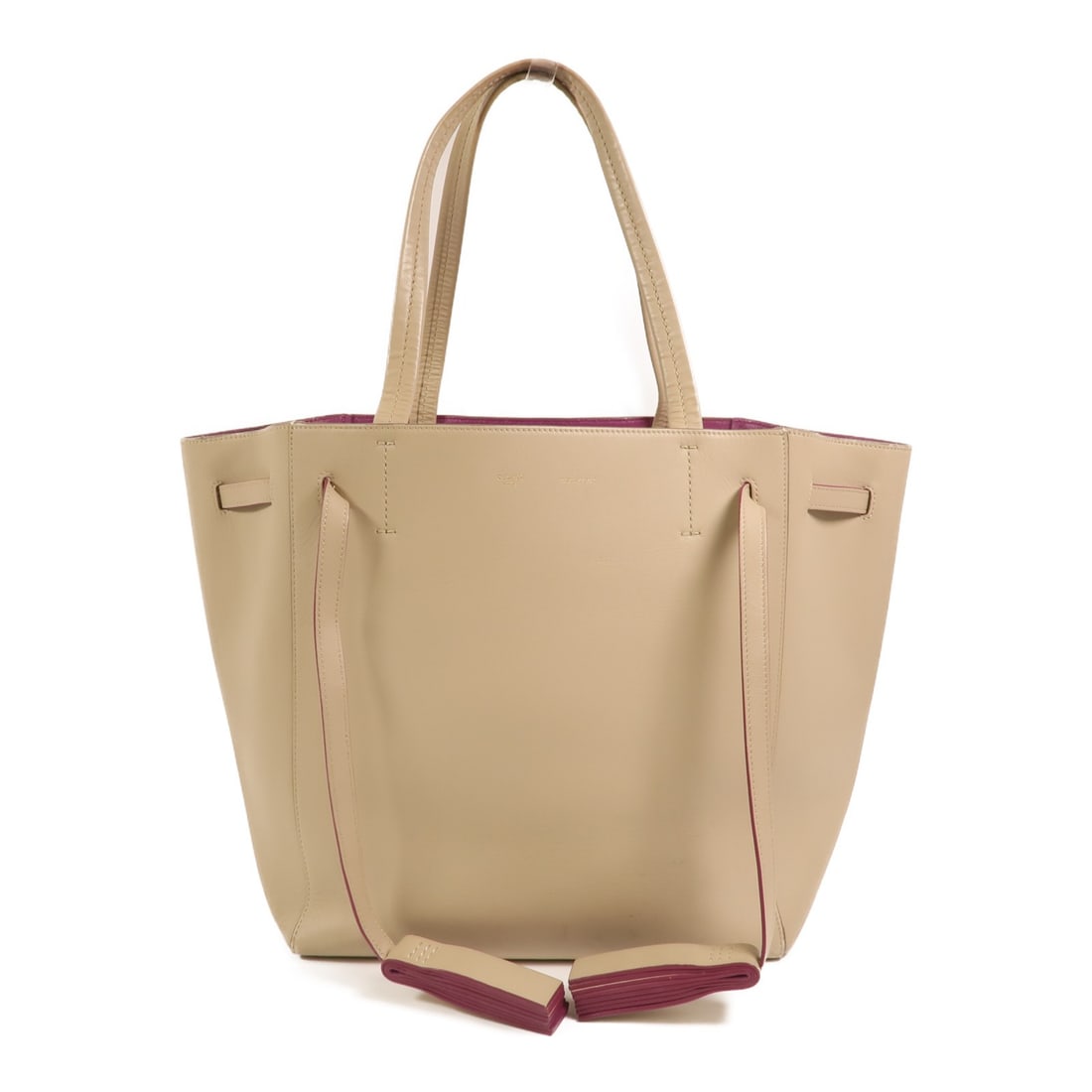 CELINE Calfskin Tote in Beige and Purple Leather: CELINE Calfskin Tote in Beige and Purple Leather This CELINE tote bag is crafted from beige calfskin leather with purple accents. Designed for women, it features a spacious interior suitable for daily