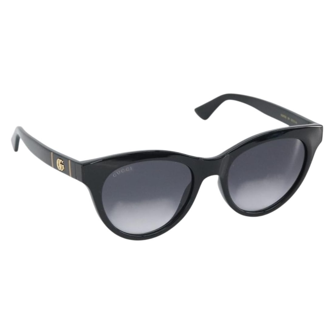 Black Plastic GG Marmont Sunglasses by Gucci with Case: Black Plastic GG Marmont Sunglasses by Gucci with Case These GUCCI GG Marmont sunglasses feature a sleek black plastic frame and are crafted in Italy. The sunglasses are in excellent un-used condition