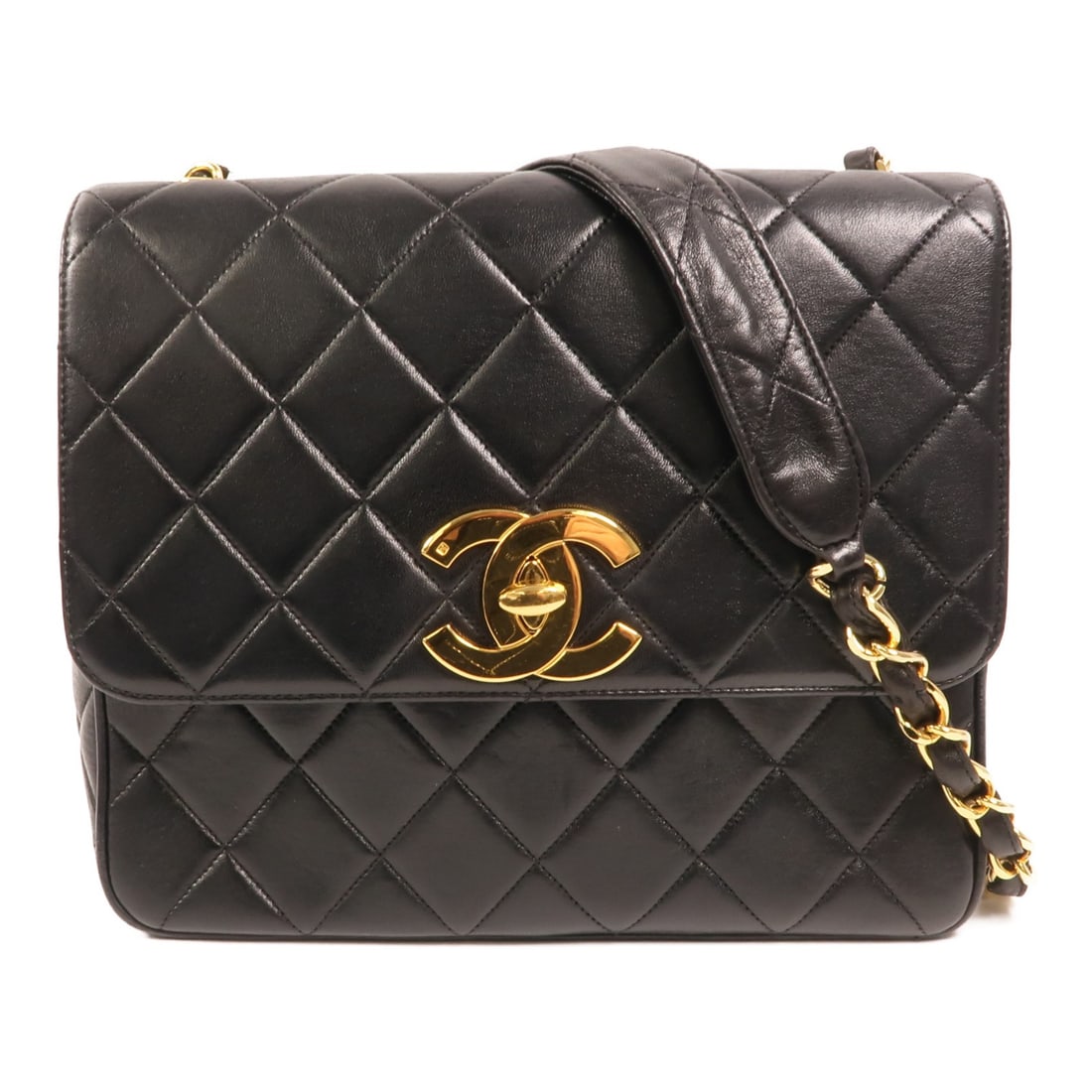 Chanel Vintage Black Lambskin Shoulder Bag with CC Gold Hardware: Chanel Vintage Black Lambskin Shoulder Bag with CC Gold Hardware This CHANEL vintage shoulder bag features the iconic CC logo and is crafted from luxurious black lambskin leather. With a classic chain