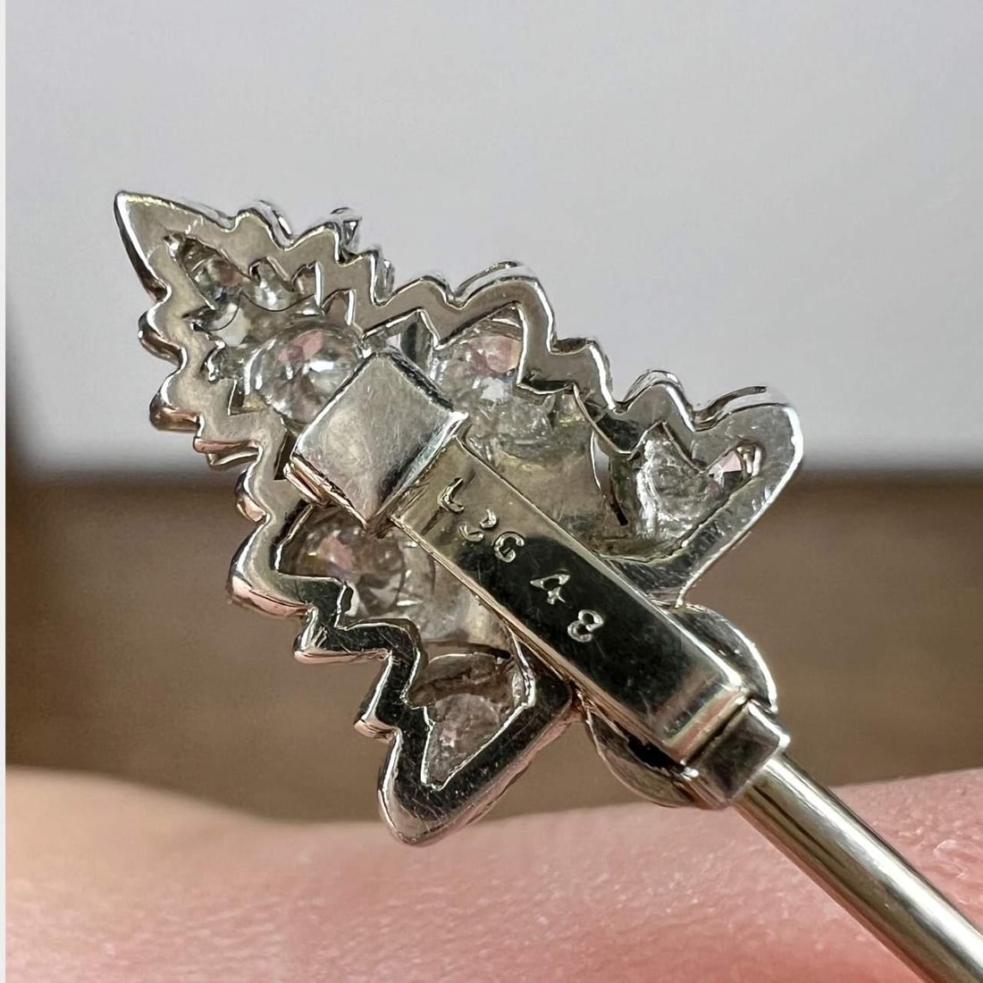 Exquisite Art Deco Jade Diamond Pin Probably CARTIER 2.25in: Exquisite Art Deco Jade Diamond Pin Probably CARTIER 2.25in This exquisite Art Deco pin features a stunning combination of jade and diamonds, showcasing a total diamond weight of approximately 1.15 ca