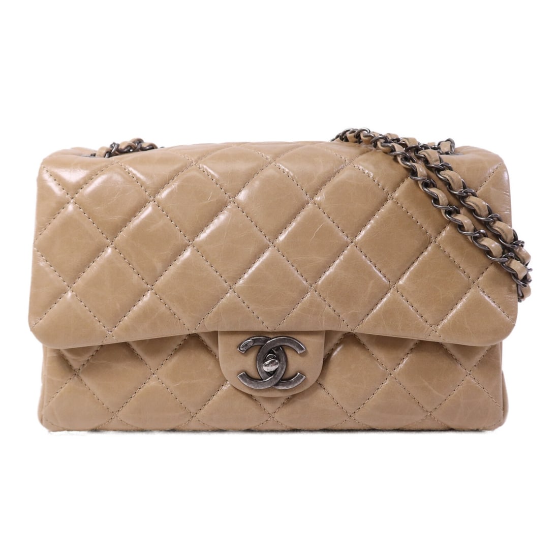 Beige Calfskin CHANEL Shoulder Bag with CC Silver Hardware: Beige Calfskin CHANEL Shoulder Bag with CC Silver Hardware This CHANEL shoulder bag features a classic CC design and is crafted from beige calfskin leather. Designed for women, it offers a timeless an