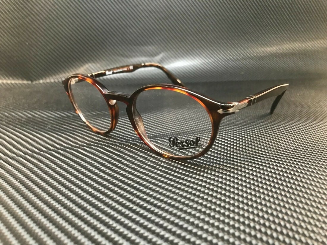 Persol PO3211V 24 Havana Unisex Eyeglasses with Demo Lenses: Persol PO3211V 24 Havana Unisex Eyeglasses with Demo Lenses Discover the elegance of Persol PO3211V 24 eyeglasses, expertly crafted in Italy. These unisex eyeglasses feature a sophisticated Havana fra