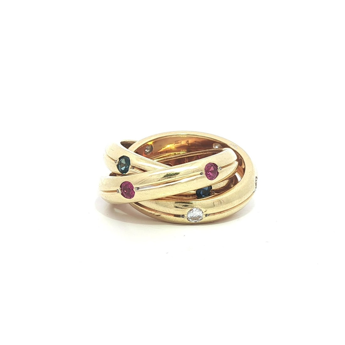 Cartier 18k Yellow Gold Ruby Sapphire Diamond Band Ring: Cartier 18k Yellow Gold Ruby Sapphire Diamond Band Ring This exquisite Cartier band ring features a stunning combination of natural gemstones, including five vibrant blue sapphires, five rich red rubi