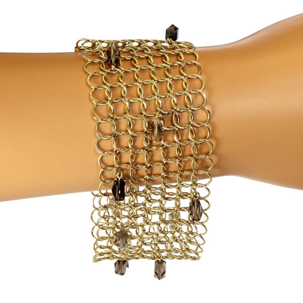 Gucci 18k Yellow Gold Circle Link Bracelet with Smoky Quartz Accents: Gucci 18k Yellow Gold Circle Link Bracelet with Smoky Quartz Accents Elevate your style with this chic and fashionable authentic Gucci bracelet, expertly crafted from luxurious 18k yellow gold with a