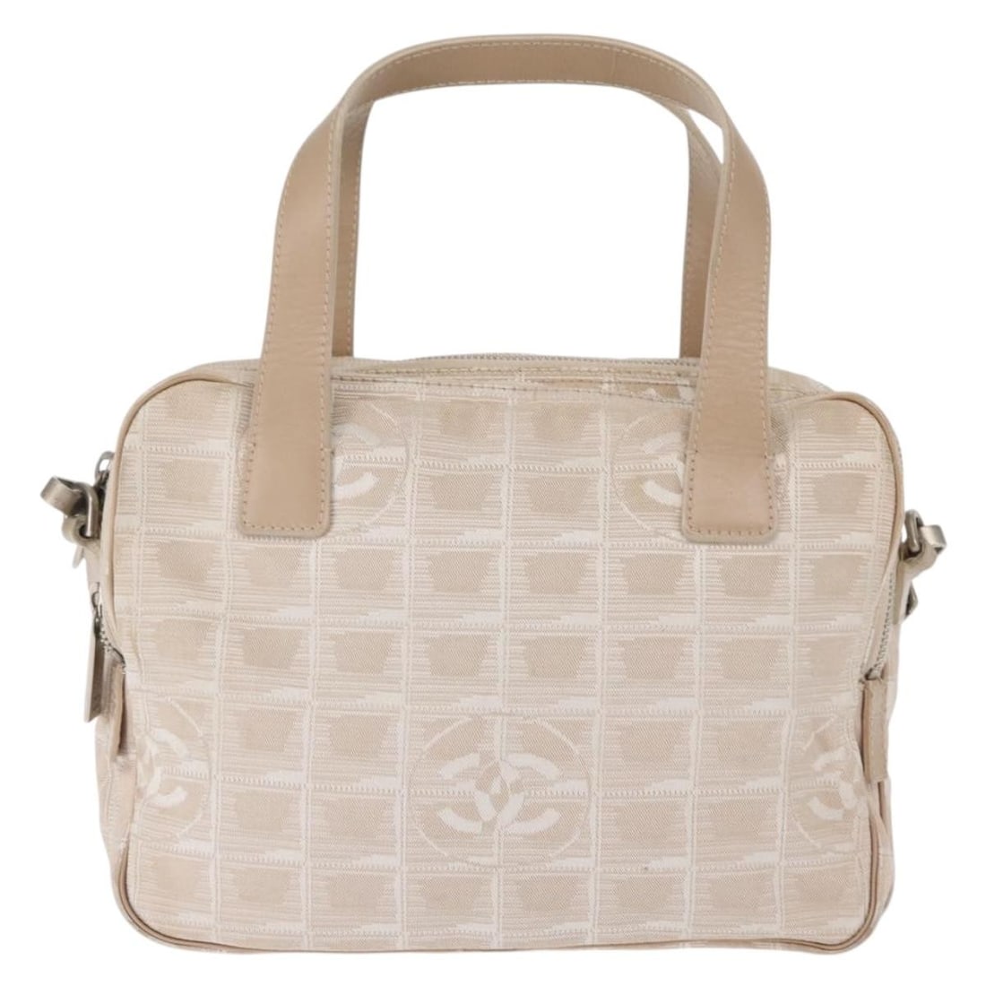Beige Chanel Travel Line Convertible Handbag in Canvas: Beige Chanel Travel Line Convertible Handbag in Canvas This Chanel Travel Line Convertible Satchel features a beige canvas exterior with leather trim and is designed for women. The bag shows surface w