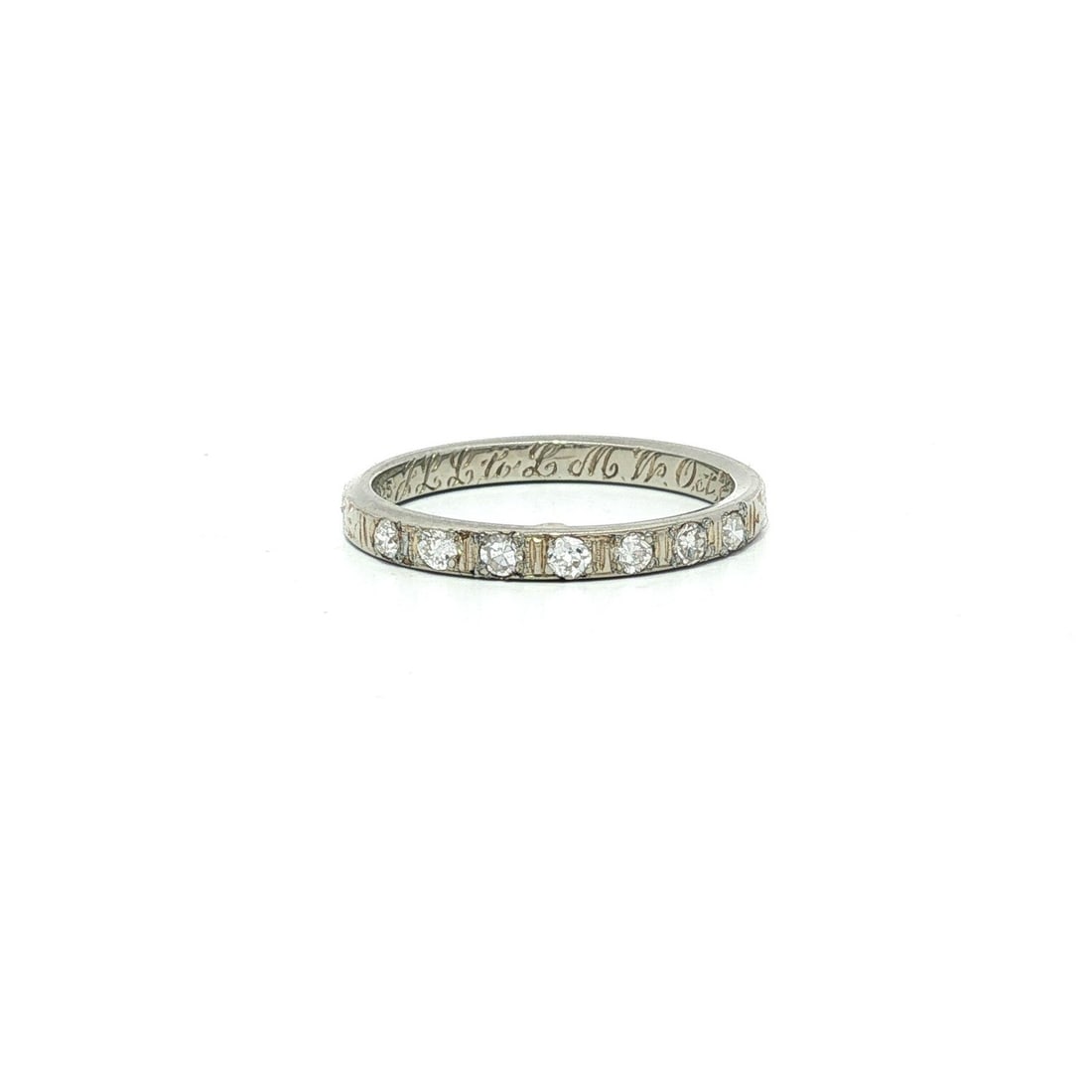 1927 Antique Art Deco 18k White Gold 0.15ctw Diamond Wedding Band Ring: 1927 Antique Art Deco 18k White Gold 0.15ctw Diamond Wedding Band Ring This stunning Antique Art Deco wedding band ring, crafted in 18k white gold, features a delicate design enriched with seven natur