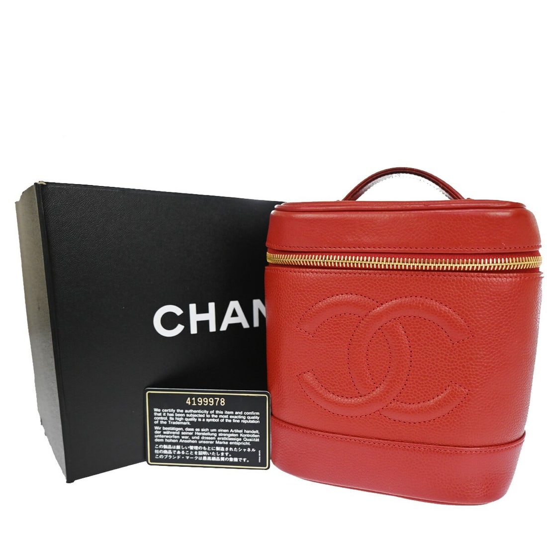 Red Leather Cosmetic Case by Chanel Vintage Timeless Model: Red Leather Cosmetic Case by Chanel Vintage Timeless Model This vintage Chanel Timeless cosmetic case is crafted from red caviar leather, designed for female use. It features a compact size suitable f
