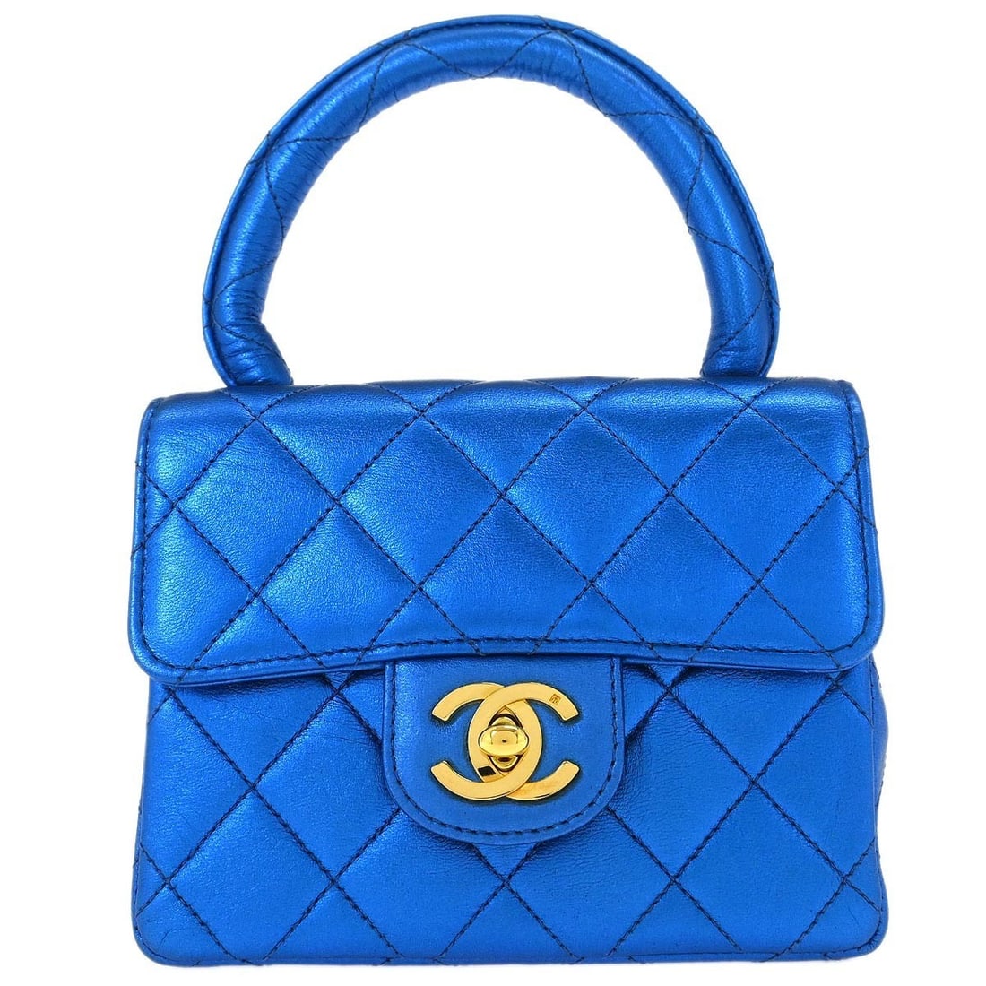 Mini Square Matelasse Lambskin Top Handle Bag in Metallic Blue by Chanel: Mini Square Matelasse Lambskin Top Handle Bag in Metallic Blue by Chanel This Chanel Mini Square handbag is crafted from metallic blue lambskin leather, featuring a quilted matelasse pattern. The bag