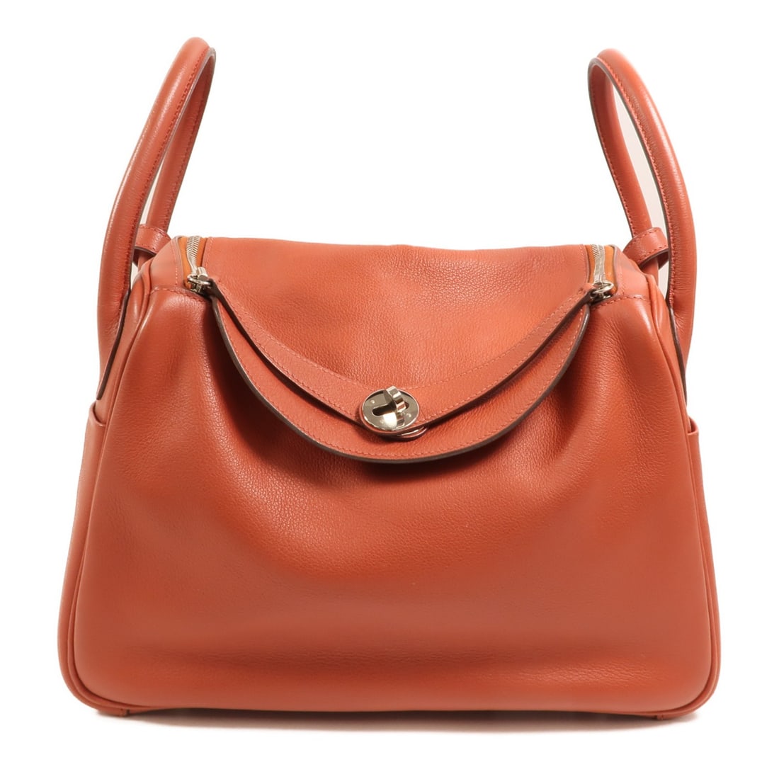 Hermes Lindy 30 Red Evercolor Leather Shoulder Bag with Palladium Hardware: Hermes Lindy 30 Red Evercolor Leather Shoulder Bag with Palladium Hardware This Hermes Lindy 30 two-way shoulder bag is crafted from high-quality calfskin leather in a rich red color. Designed for wom