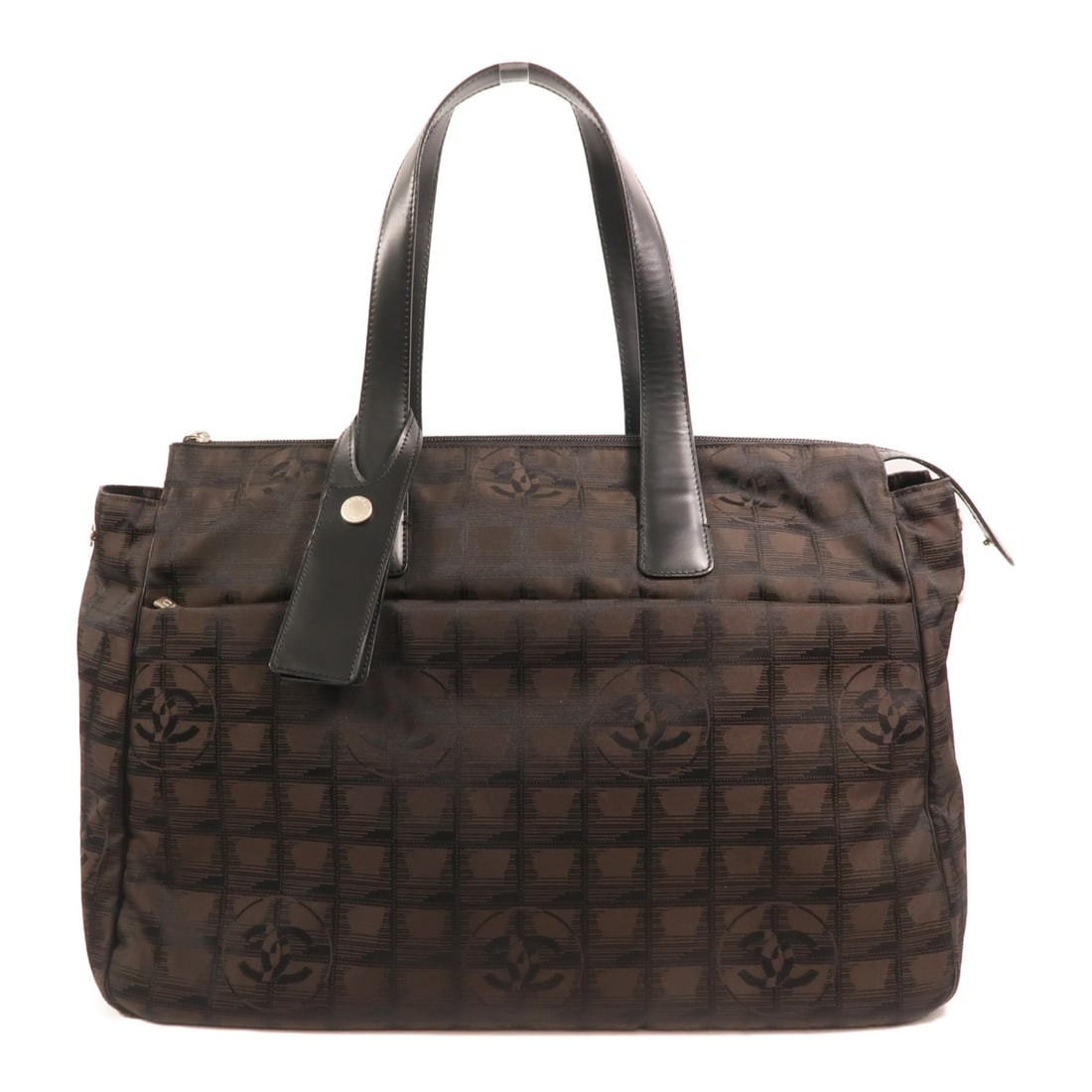 Brown Calfskin CHANEL Vintage Tote with Silver Tone CC Hardware: Brown Calfskin CHANEL Vintage Tote with Silver Tone CC Hardware This vintage CHANEL tote bag features brown calfskin leather and silver-tone hardware, offering a classic and elegant look. Designed for
