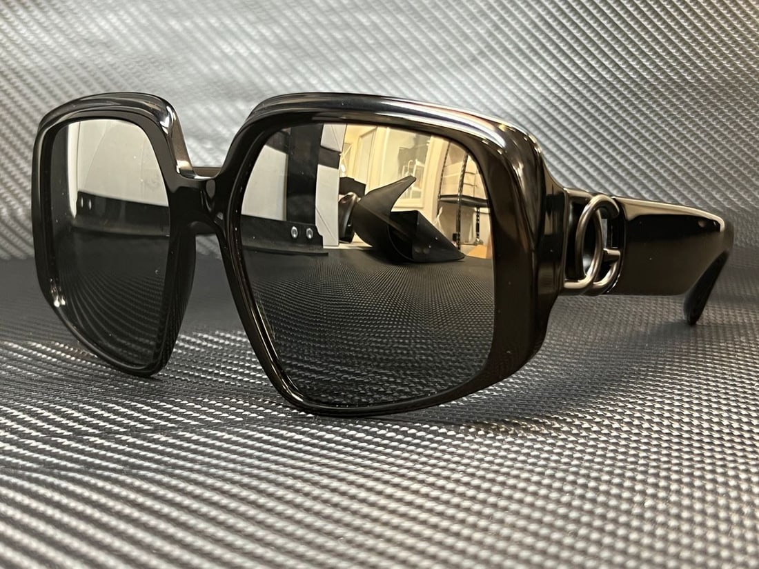 Dolce & Gabbana DG4386 Black Square Sunglasses with Gradient Lenses: Dolce & Gabbana DG4386 Black Square Sunglasses with Gradient Lenses Experience luxury with these Dolce & Gabbana DG4386 women's sunglasses, featuring a stylish square design in classic black. The grad