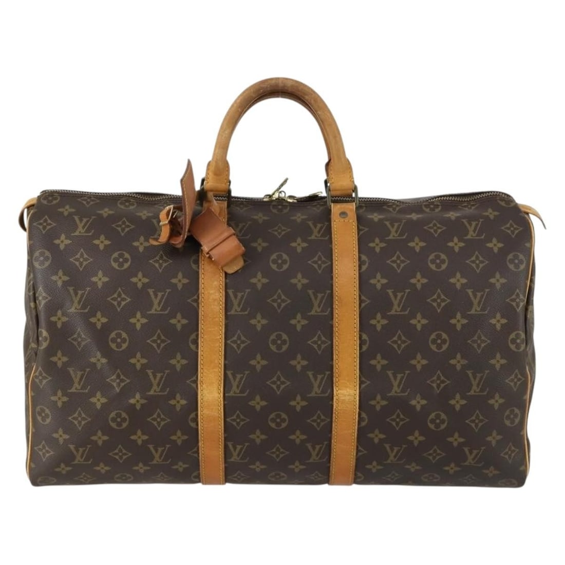 Keepall Monogram Canvas Travel Bag by Louis Vuitton Unisex 50cm: Keepall Monogram Canvas Travel Bag by Louis Vuitton Unisex 50cm This Louis Vuitton Keepall Bag features the iconic monogram canvas in brown, designed for unisex use. The bag shows signs of use with su