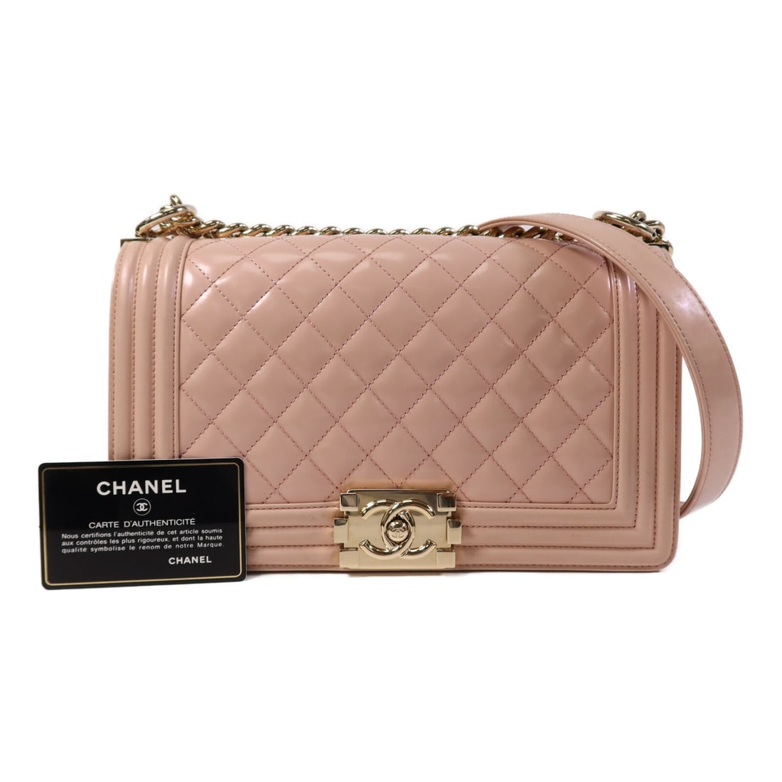 Chanel Boy 25 Patent Leather Shoulder Bag with CC Logo Gold Hardware Pink: Chanel Boy 25 Patent Leather Shoulder Bag with CC Logo Gold Hardware Pink This CHANEL Boy 25 shoulder bag features a pink patent leather exterior with signature CC detailing and a chain strap. The bag