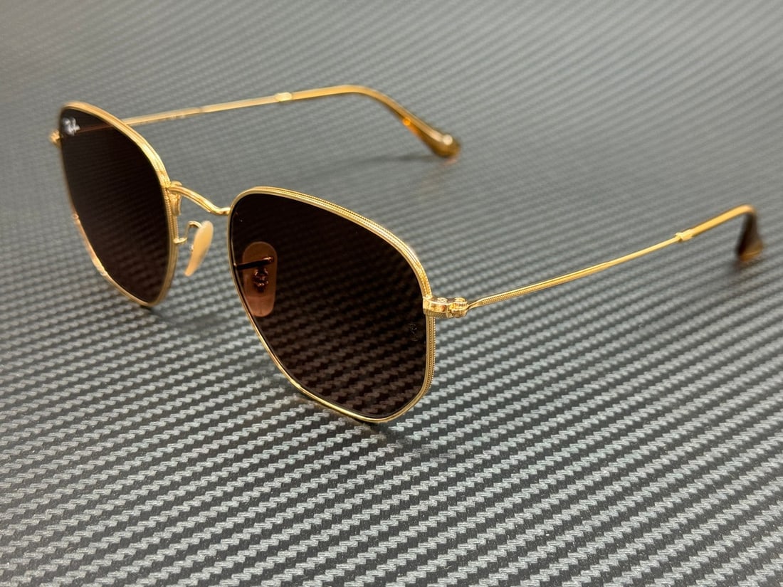 Ray-Ban RB3548N 912443 Gold Round Sunglasses with Brown Gradient Lenses: Ray-Ban RB3548N 912443 Gold Round Sunglasses with Brown Gradient Lenses Elevate your style with these Ray-Ban RB3548N 912443 Arista Round Sunglasses, featuring a chic geometric design. The sunglasses