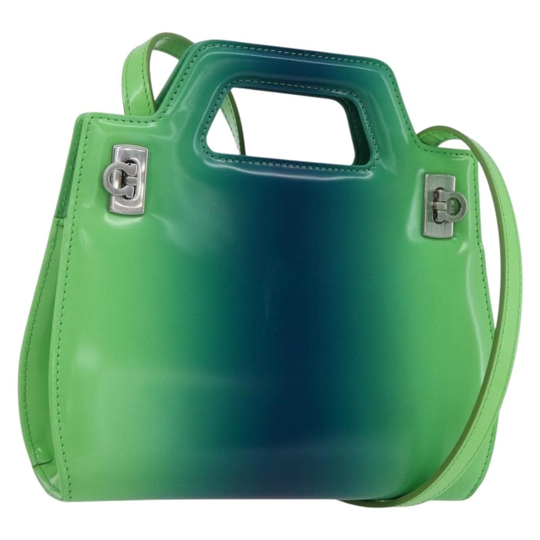 Ferragamo Enamel Convertible Handbag with Gold Hardware and Dust Bag: Ferragamo Enamel Convertible Handbag with Gold Hardware and Dust Bag This Salvatore Ferragamo handbag is crafted from enamel in a green and silver colorway. Designed for versatile use, it offers both