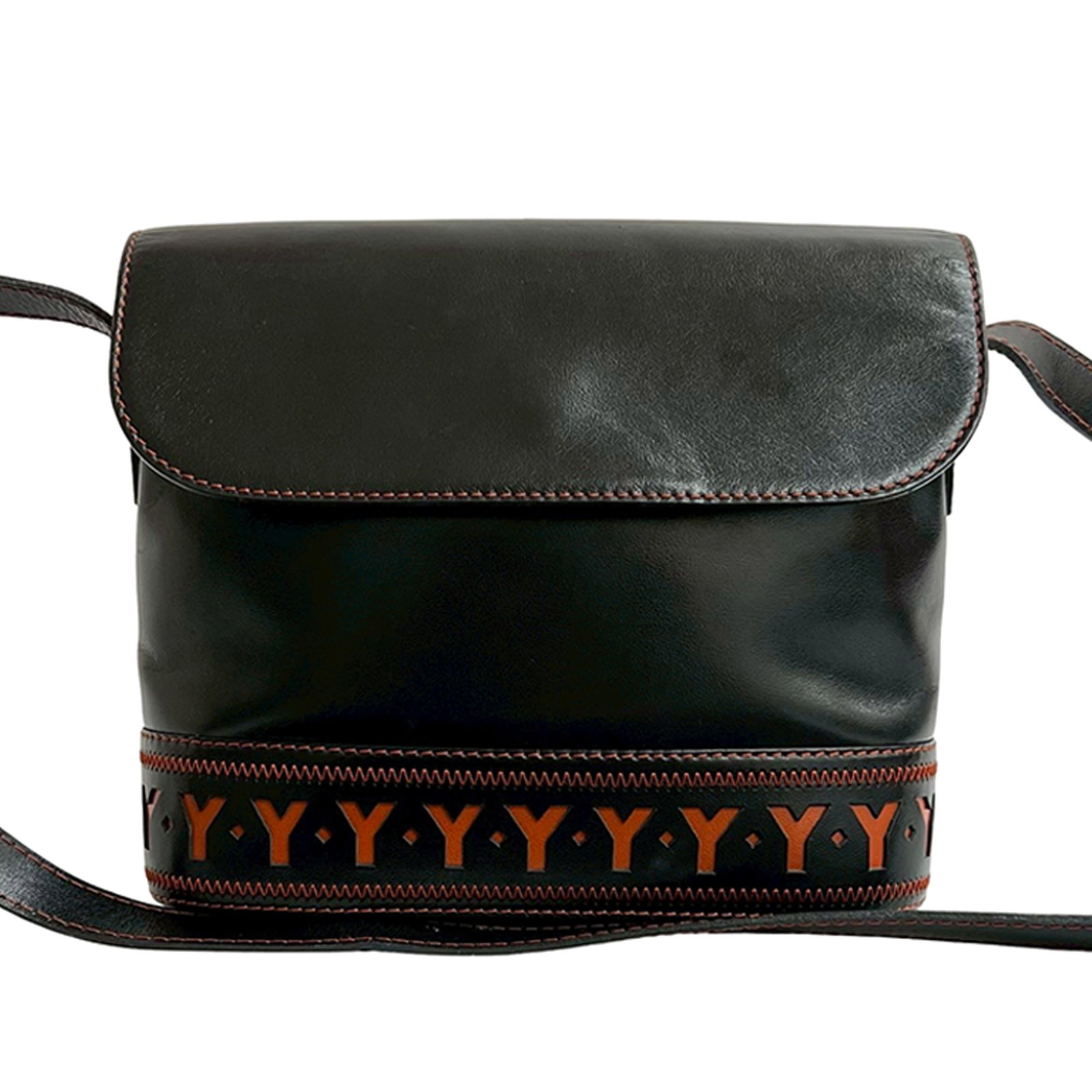 Black Leather Crossbody Bag by Saint Laurent with Cutout Detailing: Black Leather Crossbody Bag by Saint Laurent with Cutout Detailing This Saint Laurent crossbody bag showcases a black leather body with a front flap featuring a snap closure and a flat leather shoulde